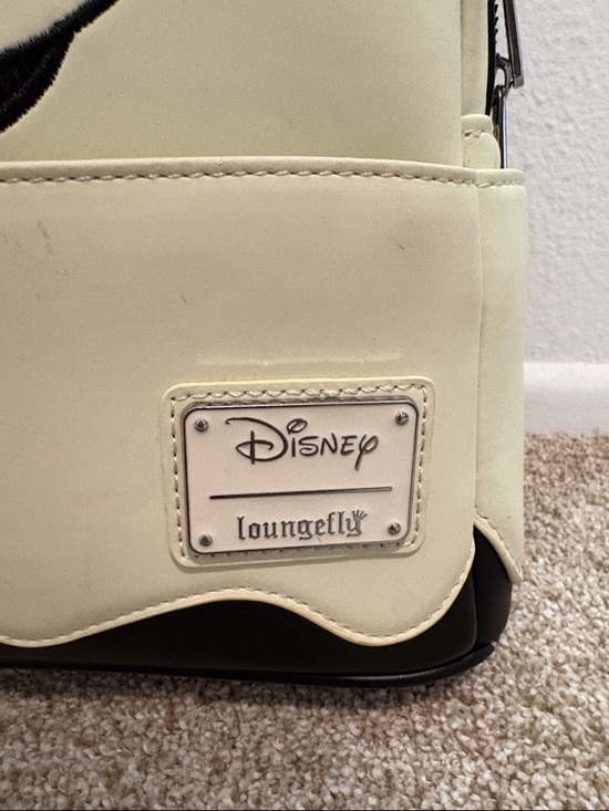 Loungefly Cream Minnie Mouse Backpack with Orange and Black Polka Dot Bow Glows main image 11